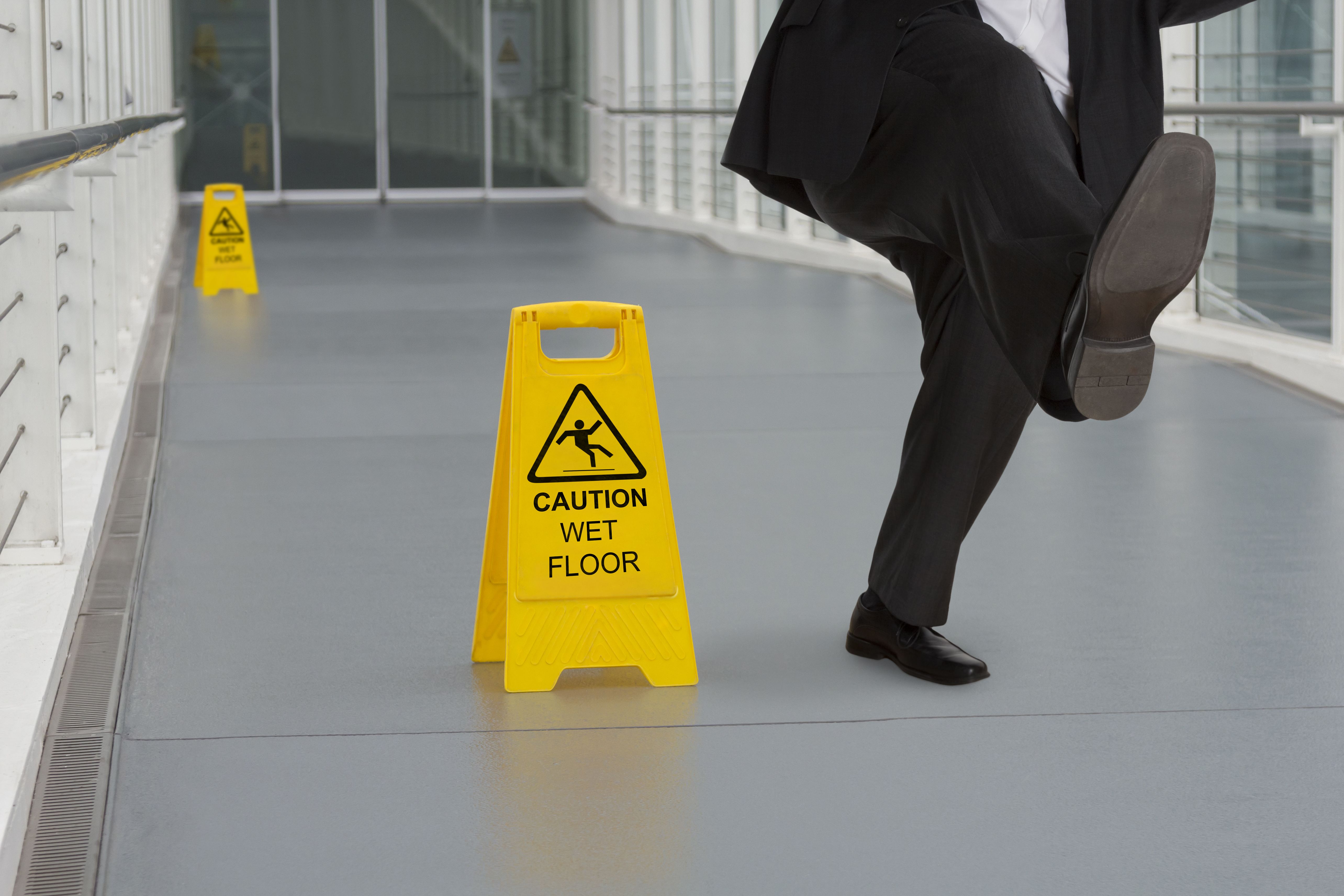 a man slipping and falling